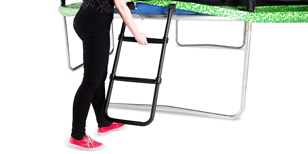 Woman climbing up trampoline safety ladder