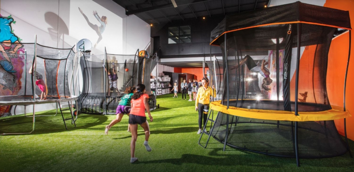 Kids playing in Vuly Play's Brisbane trampoline and play showroom