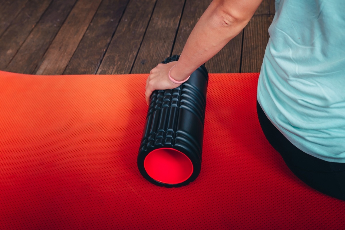 Recovery roller up close on yoga mat