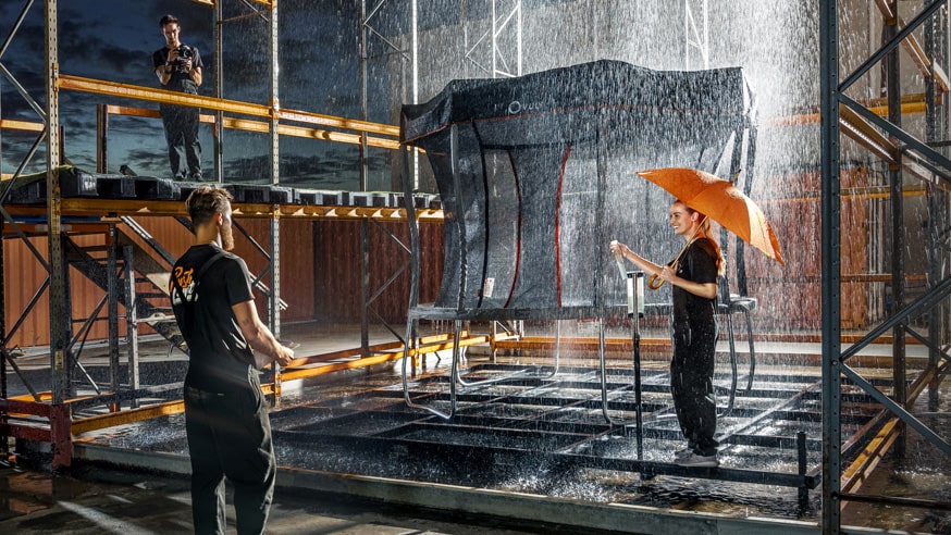 Testing our kid's trampoline for heavy rain in our R&D lab